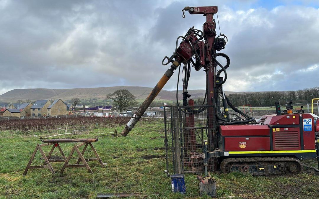 Borehole drilling team at work